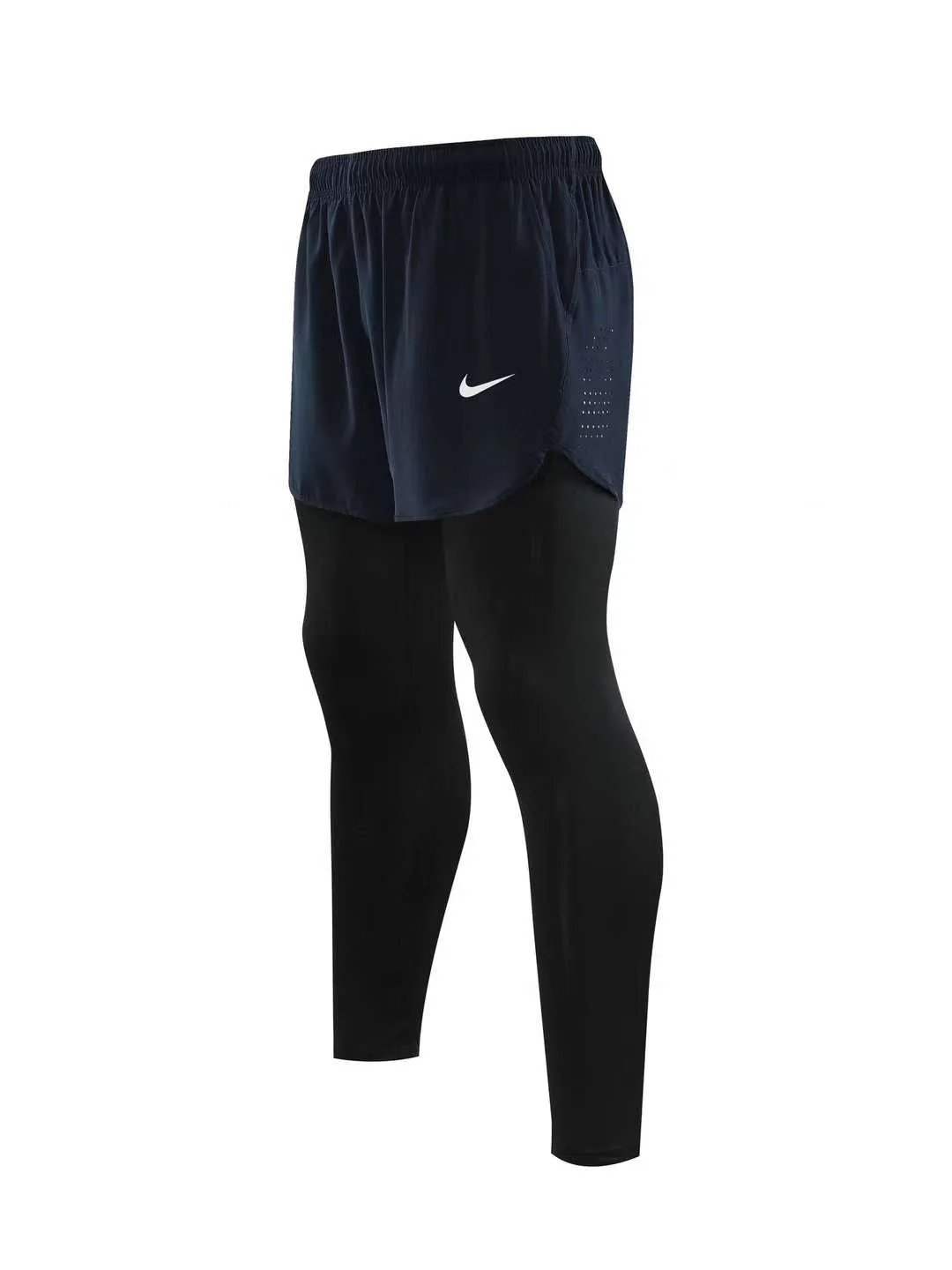 NIKE SHORTS WITH INBUILT LONG TIGHTS.